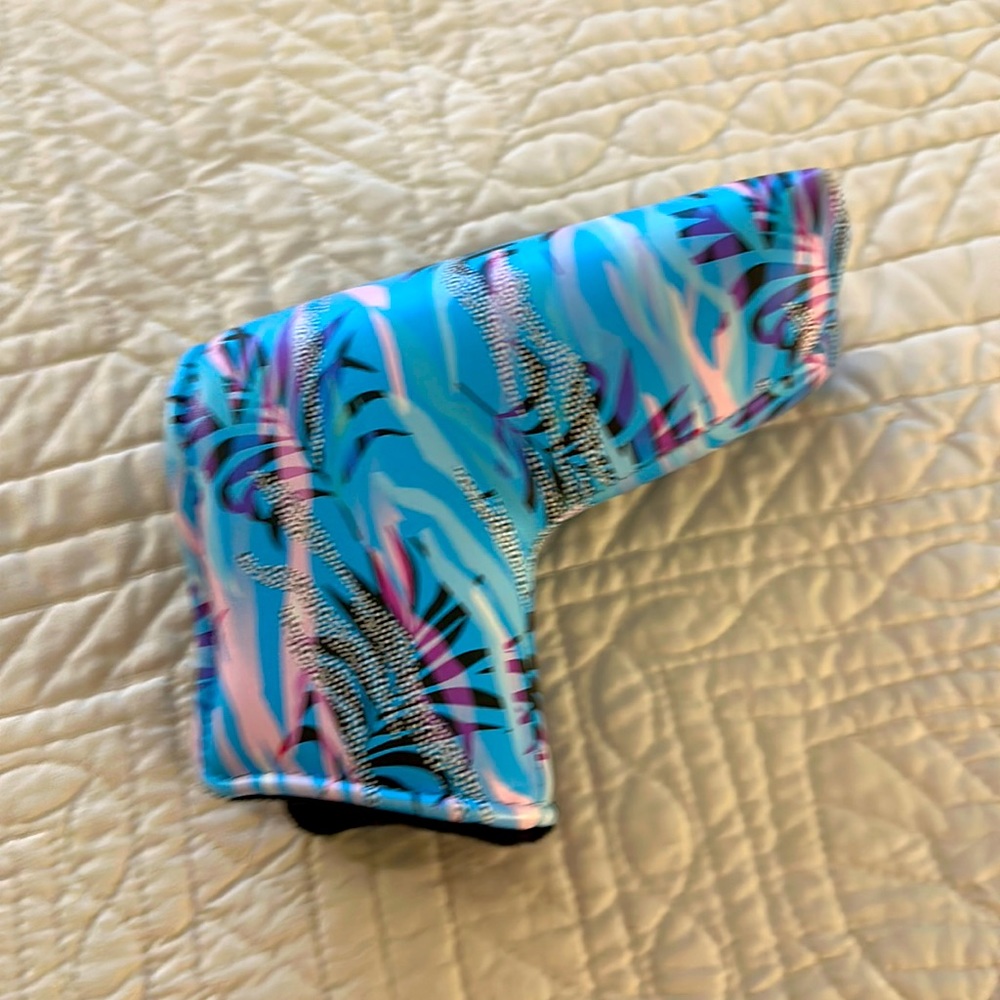 Blue and purple Noonan Golf putter cover